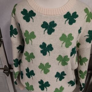 Chic Cream Sweater with Green Clover Design